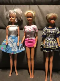 Three Vintage Barbie Dolls plus 2 other barbie dolls