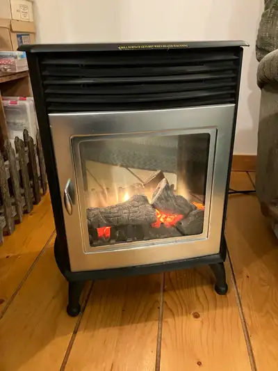 This is a very good heater that has been used very little. It has a fan and controls for heat, flame...