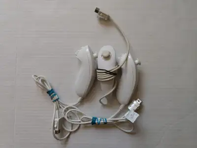 NINTENDO WII NUNCHUK CONTROLLER TESTED AND IN MINT CONDITION, View more