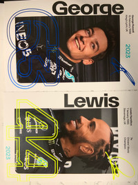 Lewis and George sign cards 