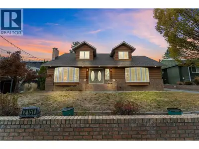 Bench Beauty with Dream Garage! Welcome to this beautifully updated 3-bedroom, 2-bathroom home locat...