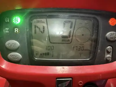 I'm selling a red Honda ATV, perfect for off-roading adventures, with 1730 miles on it. This reliabl...
