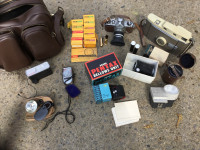 Pentax Camera, light metre, kodak film, Polaroid lot