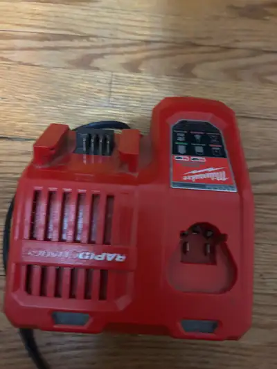Milwaukee charger and M18 battery , View more