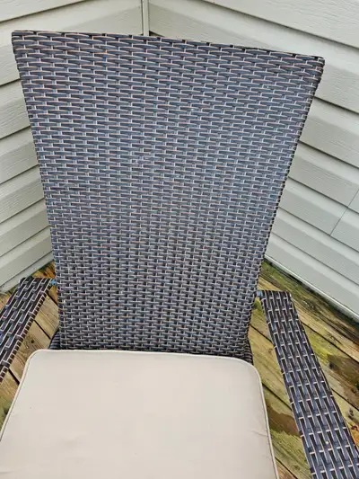 Very nice resin wicker adirondack chair with seat cushion. Like new condition. Sells at Rona for 159...