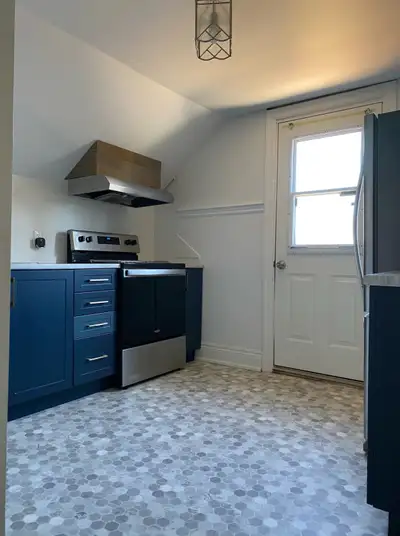 Gorgeous Century Building with all modern upgrades. High ceilings, lots of windows, hardwood floors...