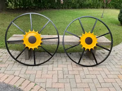 In good condition. Unique. Made from all recycled materials. Each measures 42” in diameter. Flower m...