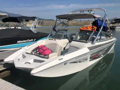 22' wake surf boat and trailer, seats up to 12, have had 10 all day comfortably. I am 2nd owner and...