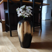 Large vase with silk flowers.