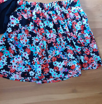 LADIES SWIMSUIT AND SKIRT $ 4 each