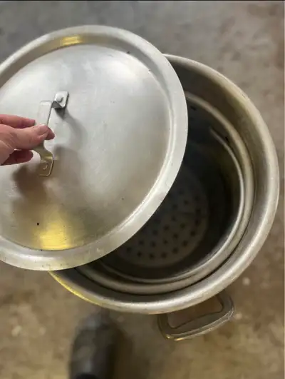 Aluminum turkey fryer 13” across 17” high. Heavy gage material Port Colborne text 705-444-3795 No de...