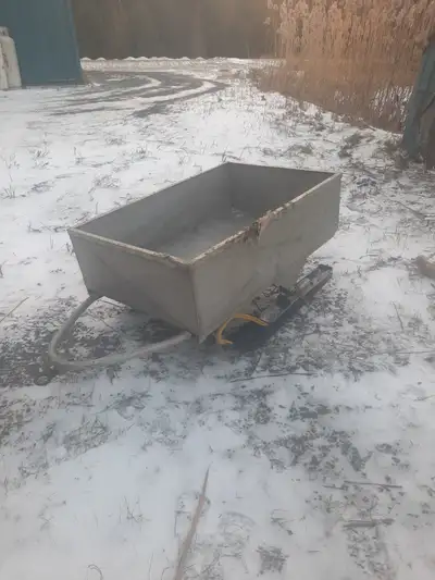 custom built aluminum sleigh, plastic ski bottoms ,fits a jiffi 10'' power auger perfectly