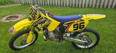 Suzuki RM250 2005, It runs good, and it's ready to ride. It comes with a lot of extras. Comes with s...