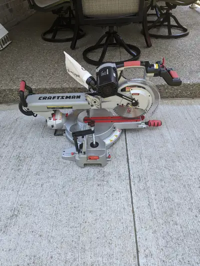 10 in. CRAFTSMAN SLIDING MITRE SAW with NEW STAND, View more
