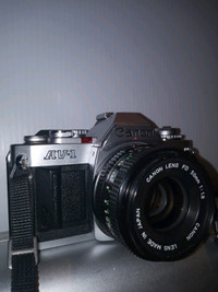 Canon AV-1   35mm SLR  Film Camera W/ 50mm F/1 . 8 Lens