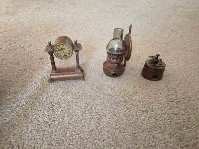 Included in Lot: Three detailed miniature pencil sharpeners: Mantel/Grandfather Clock: Features a sw...