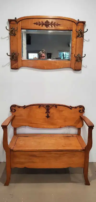 Antique with mirror and coat hooks. 35 inches wide 16 inches deep. Storage inside bench.