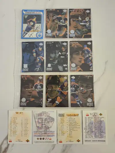 Selling 13 collectible Wayne Gretzky hockey cards Including Rookie Reprint auto signed card, 4 check...