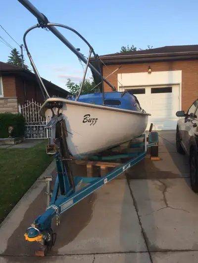 Trailer (2007) in good condition, 3500 lbs. Trailer wheels 13 diameters. The sailboat is 20 feet lon...