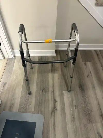 Used for 2 months Lightweight adjustable aluminum walker in good condition. Height adjustable legs w...