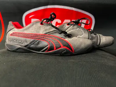 Size 9 us. 42 euro. Ducati red Trellis frame design bottom Monza racetrack designer Puma casual shoe...
