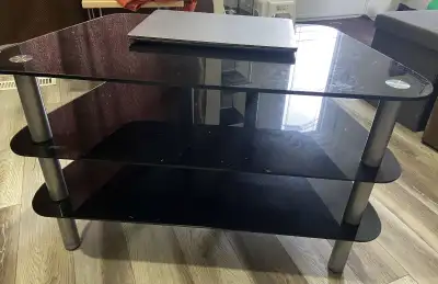 Glass TV table with 3 shelves $ 25, View more