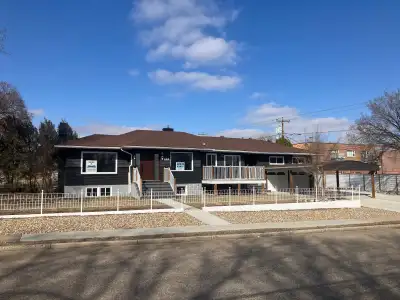 Large yard, RV parking, U/G sprinklers, Two car heated garage with oppeners, new kitchen cabinets c/...