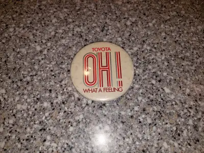 Vintage Toyota advertising pinback button (1970's), View more
