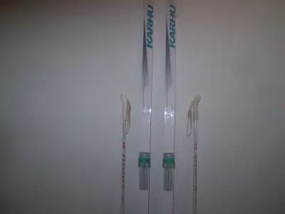 KARHU X COUNTRY SKIS 200 cm WAXLESS BASE with SALOMAN BINDINGS Great Solid Condition with Poles / Ve...