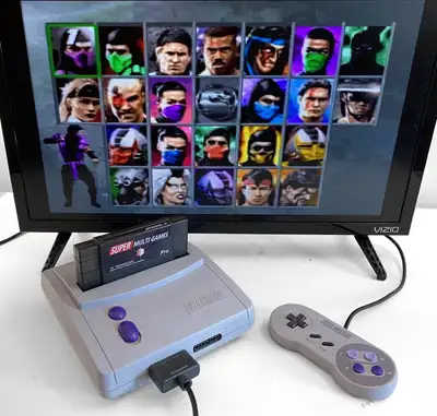 Super Nintendo SNES and games cartridge, View more