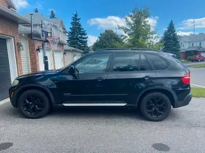 2009 bmw x5 3.0i 7 seater 2 sets of rims Weather tech mats and truck liner Is covered by global warr...