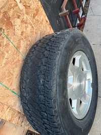Used LT265/70R17 Good Year tire mounted on GMC Aluminum Rim