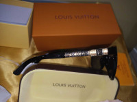 Louis Vuitton sunglasses new with box .dust bag