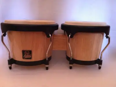 Latin Percussion LPA601-AW Aspire Wood Bongo, Natural. it has the original bag it is in perfect cond...