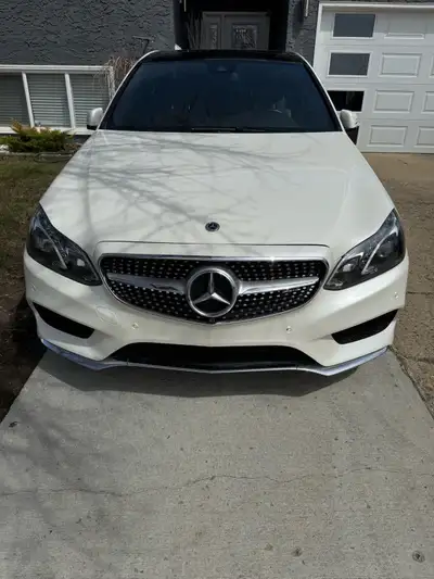 2014 Mercedes E350 4 matic all wheel drive, diamond white colour. E CLASS FULLY LOADED Always kept i...