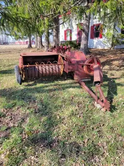 Small square baler. Requires installation of needles and replacement of wooden slides. Mechanism wor...