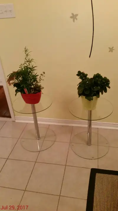 Round glass coffee table 16 inch in diameter (40 cm) in good condition. Two units each $10.00, can g...