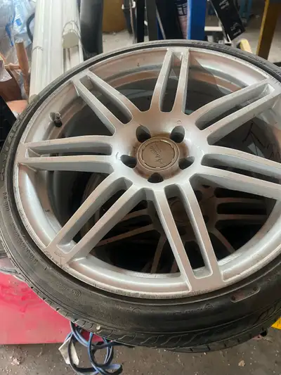 Used a anti rims and low profile tires good rubber 200$ for all 4