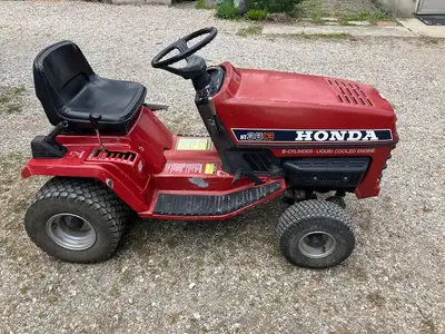 Honda HT3813 Lawn Tractor. Liquid cooled, 2 cyl ,13 HP engine. Runs well. 42" mower in very good con...