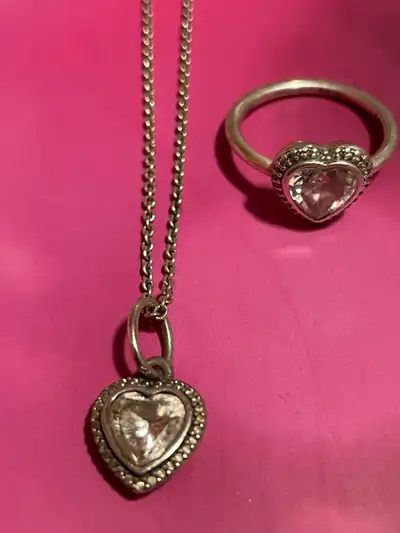 Silver chain 17” with heart pendant And matching heart ring Asking $90.00