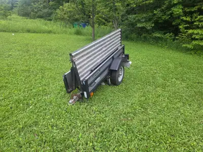 Folding utility trailer 6feet by 4 feet wide. Folds down in 90 second.