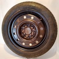 "Donut" spare tires for Ford cars