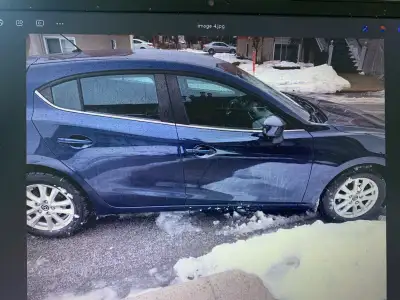 Mazda 3 sport 2015 en Bonne condition 211400 Km Freins avant neuf Pneus ete et hiver Un peu de rouil...