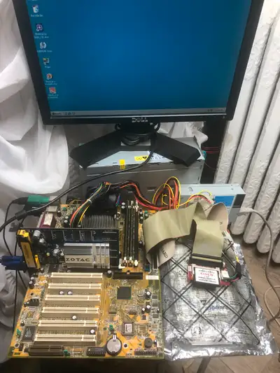Selling a motherboard/CPU/RAM set consisting of Chaintech CT6OJA3 motherboard (Intel 815 chipset), I...