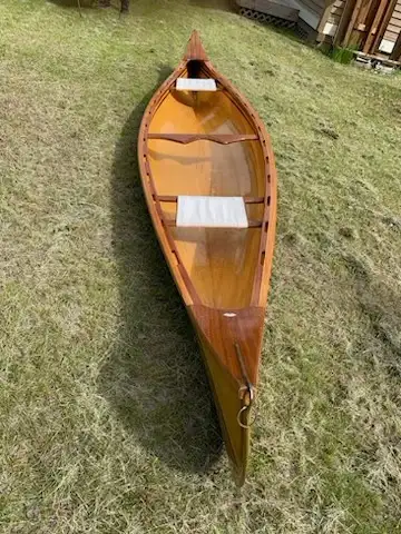 We’re selling our beautiful, hand-crafted 16' Yellow Cedar Strip Canoe, complete with paddles, perfe...