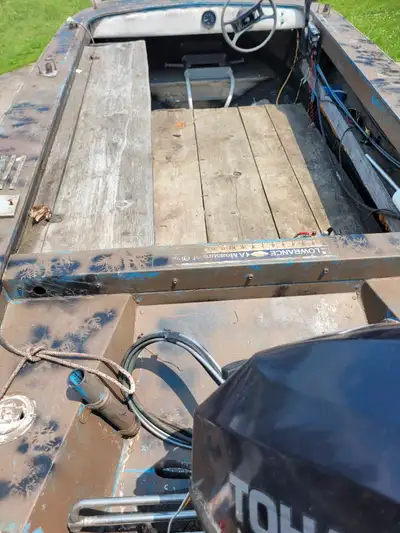 Boat and trailer. No motor 13 foot springbock deep v to handle the big lakes. set up with bench seat...