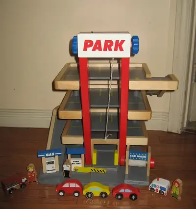 Melissa & Doug Deluxe Wooden Parking Garage / Trucks Sets, View more
