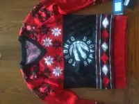 Women's Raptors sweater new with tag,  medium size