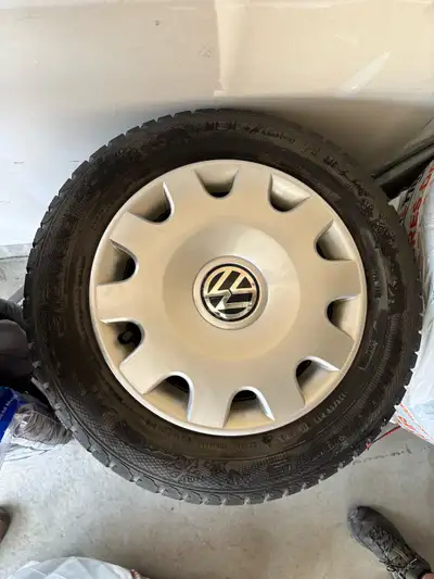 4 studded winter tires and rims. Probably a season left on the tires.
