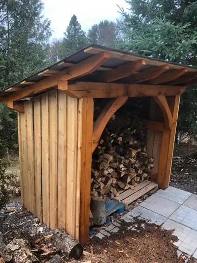 Heavy traditional timber frame shed made from white pine and pegged, easy to dissemble, stained, siz...